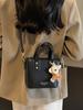Comercio exterior este año explosiones populares bolso de cubo para mujer 2024 nueva moda versátil bolso de hombro portátil nicho bolso bandolera