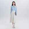 Outono/Inverno 2026 Novo Conjunto de Duas Peças Feminino Estilo Francês Manga Longa Solto Branco Versátil Camisa e Saia Tendência
