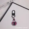 Llavero Colgante de Tarjeta de Tarot Estilo Oscuro Transfronterizo Europeo y Americano Halloween Personalizado Accesorios de Alta Gama para Bolsos y Auriculares Venta al por Mayor