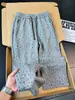 Calça de sarja com estampa de estrelas estilo americano para homens, coleção de outono, com caimento sofisticado e fluido, perna reta, corte solto, efeito emagrecedor e estilo casual