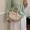 Bolsa Saco Nova Estilosa para o Dia a Dia Tendência Simples Bolsa de Ombro Feminina Nicho 2026 Bolsa Transversal Trançada