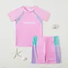 Nuevo traje de baño infantil transfronterizo, traje de baño de dos piezas con protección solar y bonitos estampados de dibujos animados, cómodo para jugar en el agua y en la playa
