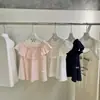 Wgwe10107 Guangzhou Shisanxing Moda Feminina 2026 Novo Estilo Manga Curta Solta com Renda Ombro a Ombro Blusa Top Verão