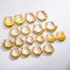 2025 Novos Brincos de Aço Titânio Elegantes Versáteis Titânio em Forma de U Redondo Embossed Tridimensional Pressão de Óleo Joias Atacado