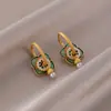 2026 Otoño e Invierno Nuevo Modelo Suministro del Fabricante Nuevo Estilo Chino Retro Exquisitos Pendientes y Clips para Orejas con Forma de Caqui Venta al por Mayor en Stock