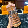 Copo de água plástico explosivo de grande capacidade 2000 ml para esportes de verão ao ar livre com escala copo de água resistente a altas temperaturas fábrica