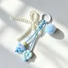 Novo chaveiro de garrafa de desejos de flor colorida trançada em acrílico feito à mão, alça de celular, pingente de bolsa com pompom de pérola