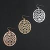 Joyería para Orejas de Metal Europea y Americana para Mujer Placa de Cobre Tallada Hueca Ovalada Distintiva Creativa Estilo Étnico Textura Pendientes Retro