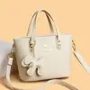 Bolso bandolera de textura suave de cuero para mujer, bolso de mano nuevo, moderno y de alta gama para el trabajo y los desplazamientos, bolso tipo cubo, bolso para teléfono