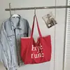 Bolsa de mano casual de nailon estilo coreano, bolso de mano de moda con estampado de letras, nuevo bolso de hombro de doble cara de verano para mujer