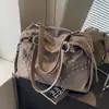 Bolsa de Gran Capacidad Transfronteriza para Mujer 2026 Nuevo Bolso de Hombro Casual Remachado Bolso de Mano Estilo Perezoso Ligero Bolsa Tote