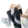 Shorts Casuais Listrados Largos Masculinos e Femininos da High Street Americana Moda Tendência de Verão Shorts Esportivos de Basquete