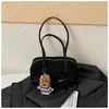 Bolso de Axila con Lazo 2026 Nuevo Bolso de Hombro de Moda Bolso de Mano Simple Moderno Bolso Almohada Texturizado y Elegante
