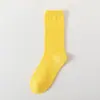 Meias de cor pura femininas de algodão meia-panturrilha felpudas para primavera, verão, outono e inverno meias femininas listradas Zhuji doces ins meias de algodão atacado