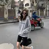 Sudadera negra con capucha para mujer, nueva popular chaqueta fina de otoño e invierno 2026, top casual grueso con forro polar de principios de primavera, moderno