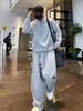 Tendencia Otoño 2025 Traje Casual de Botón Turquesa de Gama Alta para Hombre Conjunto de Dos Piezas Sudadera y Pantalón de Chándal Sueltos y Fáciles de Combinar para Pareja