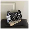 Bolso de mujer de moda 2026 estilo nuevo, de lunares moderno, bolso de mano fresco para el antebrazo, lindo bolso de hombro diario para estudiantes para salir