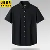 Verano nuevo camisa de solapa para hombre suelta color liso moda blusa de Tencel botón bordado manga corta fina 2095