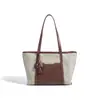 Bolsa de ombro de nicho de alta qualidade para o início do outono de 2026, bolsa de grande capacidade para notebook de trabalho, bolsa versátil e elegante de couro genuíno