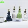 Botella de Desinfectante de Manos de Hotel de Alta Gama con Forma de Falda de 300ml Botella Dispensadora de Champú y Gel de Ducha Tipo Prensa de PET