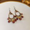 Pendientes largos bohemios vintage con diseño étnico, geométricos, con forma de gota de aceite, hojas y plumas, a la moda, para mujer