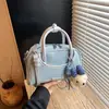 Moda Transfronteriza Simple y Versátil Primavera 2026 Nuevo Estilo Alta Calidad Diseño de Nicho Bolso Pequeño Cuadrado Cruzado de un Solo Hombro para Mujer