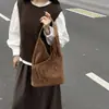 Bolsa Feminina 2025 Nova Casual Bolsa com Franjas Retro Melard Bolsa de Ombro Grande Capacidade Versátil Pequena Bolsa de Axila