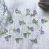 Joyería para uñas Tulipán de alta calidad permeable al hielo diseño de nicho aretes material luminoso para usar en la uña parche francés para uñas