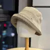 Sombrero de pescador vintage a rayas de estilo coreano para principios de otoño para mujer, versátil, hace que la cara se vea más pequeña, con ala enrollada, sombrero de cubo plegable