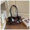 Bolso minimalista para el trabajo, bolso de moda plisado 2025, bolso de mano de un solo hombro, estilo coreano, bolso de nicho para el hombro, bolso de moda de gran capacidad para mujer