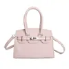 Bolso pequeño cuadrado casual de moda nueva tendencia primavera 2026 bolso de hombro cruzado simple único para mujer con textura