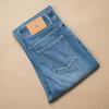 Jeans de Campana Adelgazantes Azules Lavados de Nuevo Estilo para Mujer con Pequeños Aberturas Laterales, Pantalones de Mezclilla Versátiles Elásticos