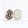 ABS estilo coreano blanco y negro trébol de cuatro hojas DIY pegamento de crema accesorios para joyería pequeños accesorios pendientes pasador de pelo agujero material para zapatos