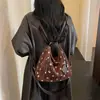 Mochila transfronteiriça de nicho retrô com bolinhas de grande capacidade para mulheres, nova coleção outono 2026, bolsa de ombro estilo casual, bolsa para o dia a dia