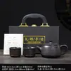 Juego de té de arcilla púrpura, que incluye una tetera y cuatro tazas, un juego de regalo de alta gama para uso doméstico, adecuado para ocasiones de negocios y se puede personalizar con un logotipo