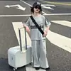 Comércio Exterior 2026 Verão Novo Estilo Conjunto Versátil da Moda Casual para Esportes ao Ar Livre Treino Manga Curta Calça Longa em Estoque