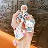 Llavero de Gato Flocado Transfronterizo con Lazo en Forma de Corazón, Lindos Accesorios para Bolsos, Pequeños Regalos, Venta al por Mayor de Comercio Exterior