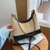 2025 Nova Elegante Cor Sólida Feminina de Inverno Grande Capacidade Retro Estilo Coreano Corrente na Alça Bolsa de Ombro Transversal Bolsa de Bolinho