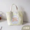 Linda bolsa de mano nueva, bolsa de lona versátil para oficinistas, bolsa estilo coreano para salidas, bolsa de estudiante, bolsa de bebé y bolsa para el almuerzo