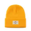 Gorro de Lana Nuevo Transfronterizo Color Sólido Etiquetado Moda Gorro Tejido Otoño e Invierno Versátil Cálido Protección para Orejas Transpirable Gorro para el Frío Venta al por Mayor