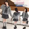 Conjunto de Roupa de Outono para Meninas 2026 Novo Fashionável Cinza Moletom de Manga Longa e Saia de Lã Conjunto de Duas Peças para Crianças Mais Velhas