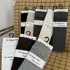 Calcetines para mujer, calcetines de felpa sin costuras, calcetines de media pantorrilla para otoño e invierno, estilo coreano, sencillos, versátiles, con rayas verticales, calcetines largos de color liso