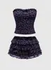 Conjunto de moda de verano transfronterizo europeo y americano, top sin mangas con estampado de leopardo, espalda descubierta, con lazo y falda escalonada, venta al por mayor