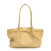 Bolsa Tote com Laço de Nicho Feminina Moda 2025 Primavera e Verão Estilo Coreano Versátil de Alta Qualidade Plissada de Ombro/Axila