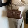 Nova Bolsa de Trabalho Grande Capacidade Versátil Nicho Ombro Único de Mão Bolsa 2026 Casual Feminina Axila Moda