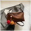 Bolsa de Mão Estilo Coreano para o Dia a Dia Bolsa Almofada para Mulheres 2026 Nova Bolsa Boston Retro de Nicho de Alta Qualidade Bolsa de Ombro Único Transversal