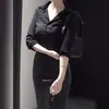 Conjunto de Camisa Sexy de Gola V Manga Longa Preta de Alto Padrão e Saia Bodycon Elegante de Corte Justo para Mulheres Primavera/Verão 2026