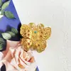 Nuevo broche de mariposa tridimensional estilo palacio vintage incrustado con pequeños diamantes metal animal alta calidad ropa venta caliente transfronteriza