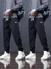Venta al por mayor del fabricante Pantalones Jogger Casuales Ajustados Nuevos para Hombre Marca de Tendencia Ins Pantalones Deportivos Sueltos Largos con Puño de Tendencia