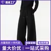 Pantalones deportivos versátiles de calle americanos transfronterizos para hombre y mujer, pantalones deportivos de pierna ancha con retazos de marca de moda, pantalones rectos casuales holgados de alta resistencia